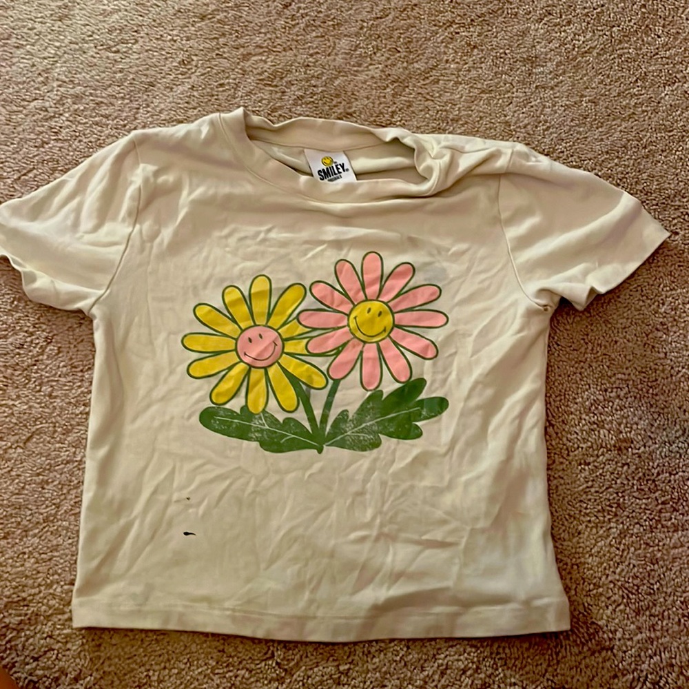 flower tee shirt it has a small stain on it